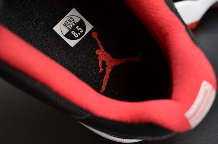 air jordan 11 retro low "bred" black/ red mens 528895-012